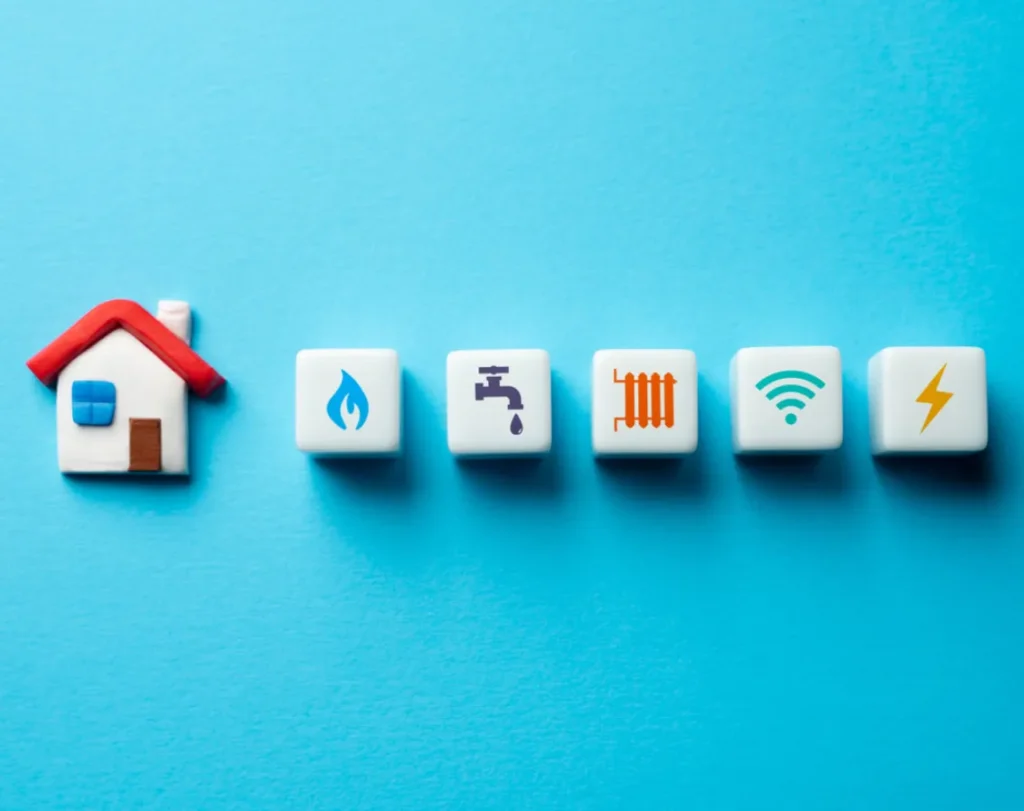 A small clay house with squares on the right representing anything that could be reported as a problem within an apartment that needs fixing